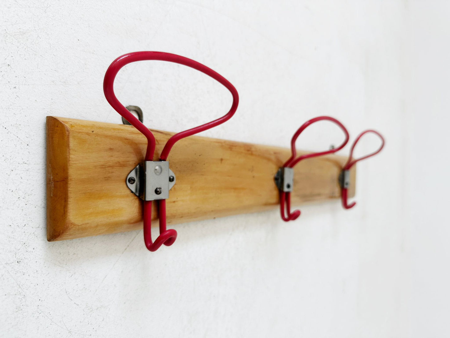 Clothes hanger with three hanges
