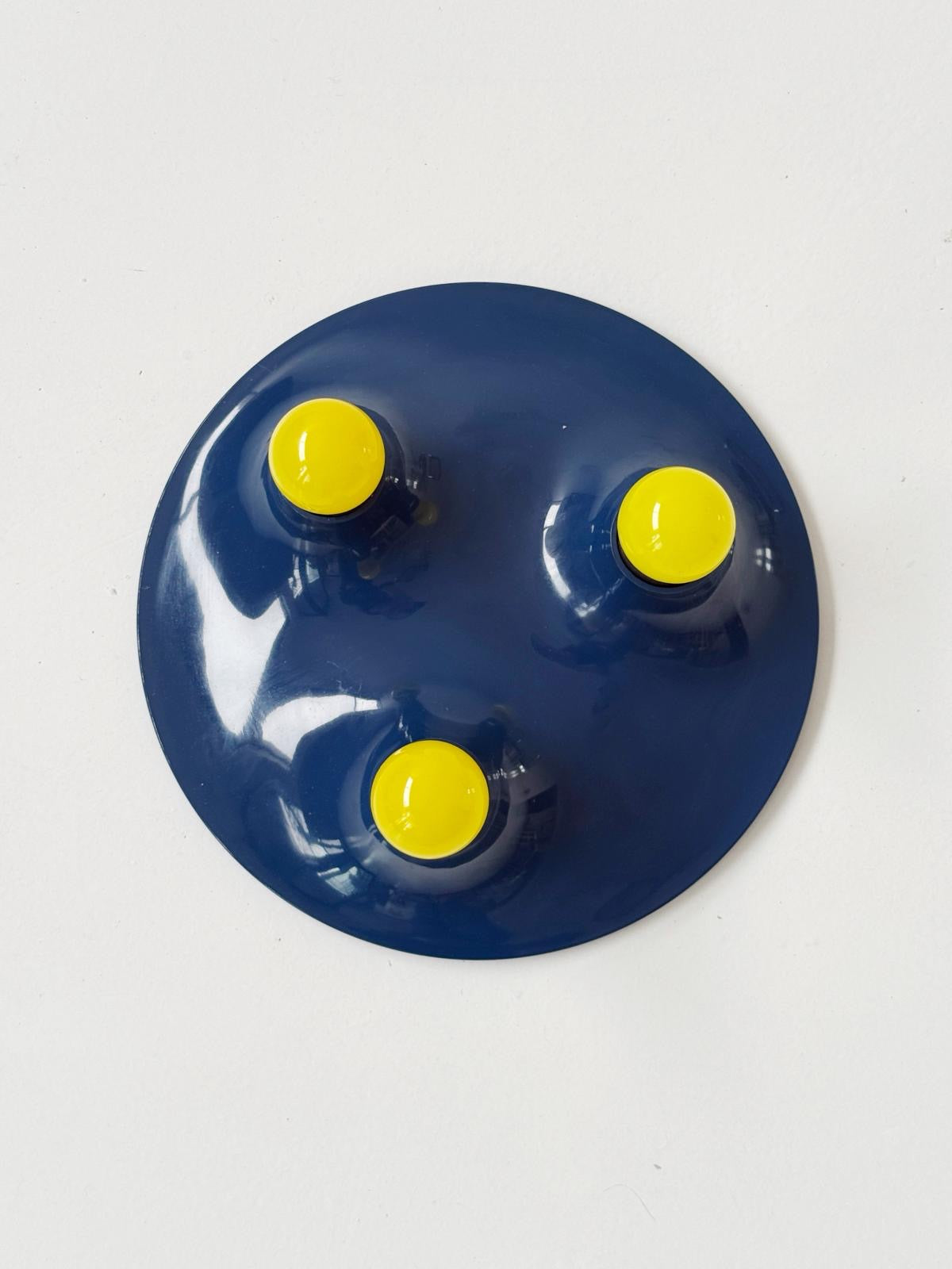 Lampada da parete “Triteti” – Artemide, disegnata da Vico Magistretti