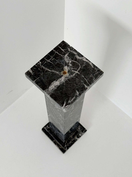 Black veined marble backsplash