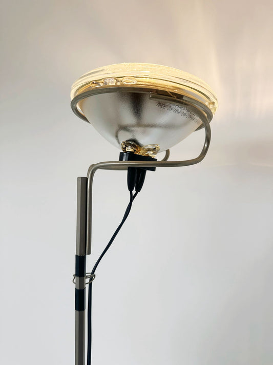 Toio floor lamp, design by Achille and Pier Giacomo Castiglioni for FLOS