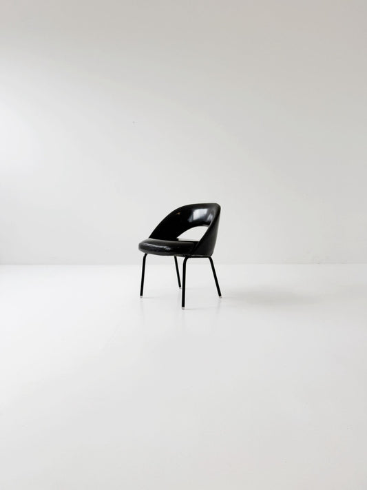 Poltrona nera con scocca sagomata – anni '70