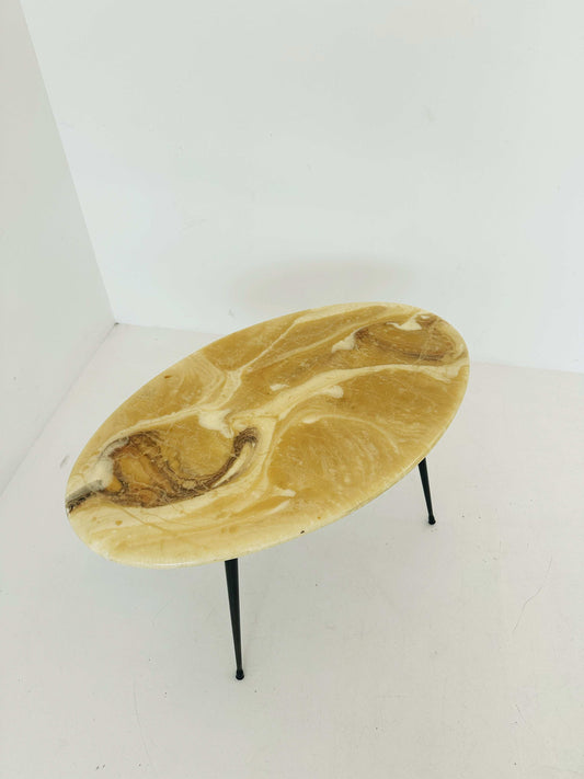Coffee table with faux marbled top and painted metal legs