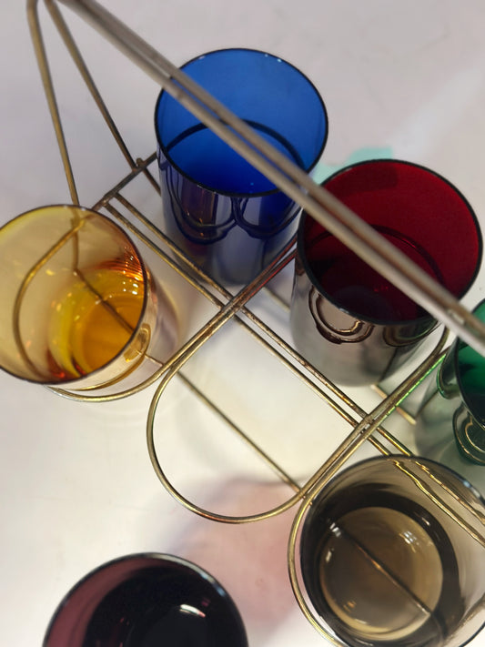 Six colored glasses with cup holders