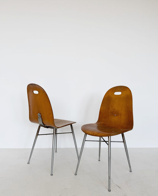 Pair of curved wood chairs