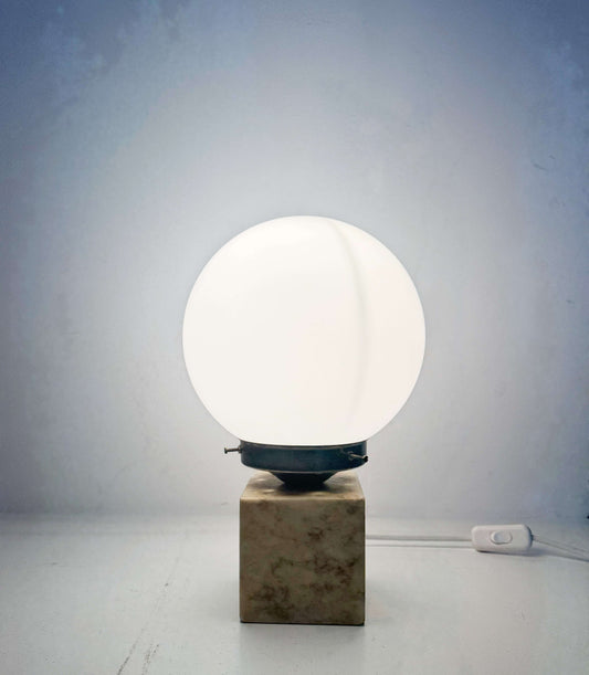 Marble table lamp with opal glass sphere