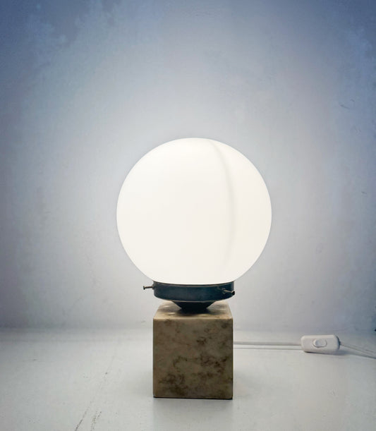 Marble table lamp with opal glass sphere