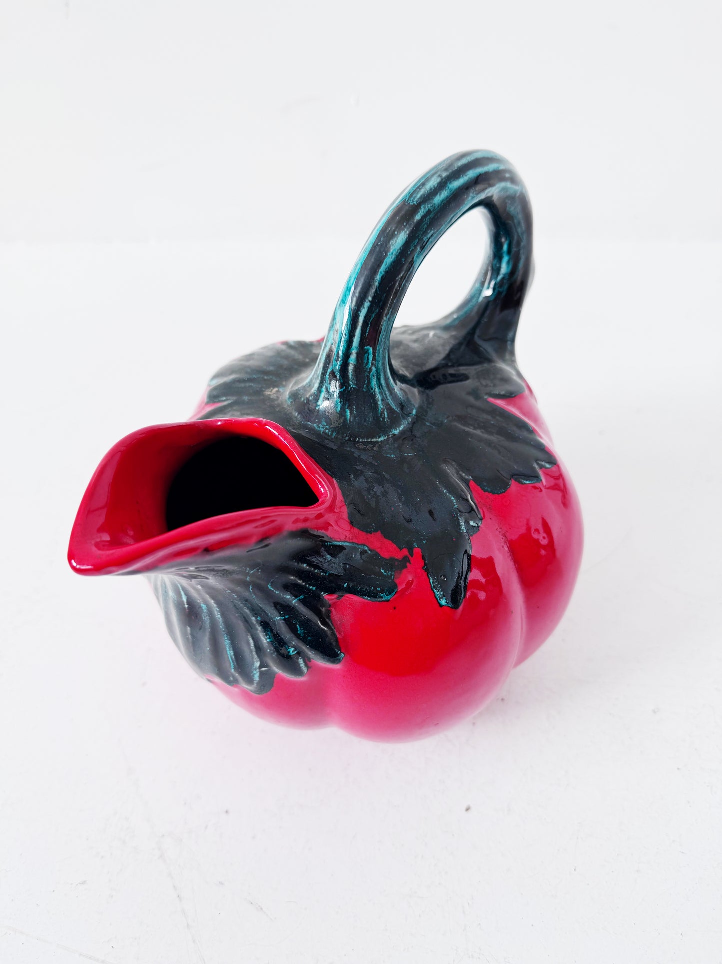 Glazed ceramic tomato-shaped pitcher
