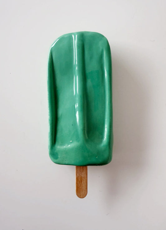 Decorative turquoise-green glazed ceramic popsicle