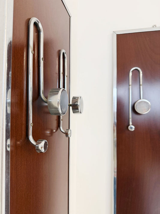 Pair of elegant wall coat hangers from the 1960s and 1970s