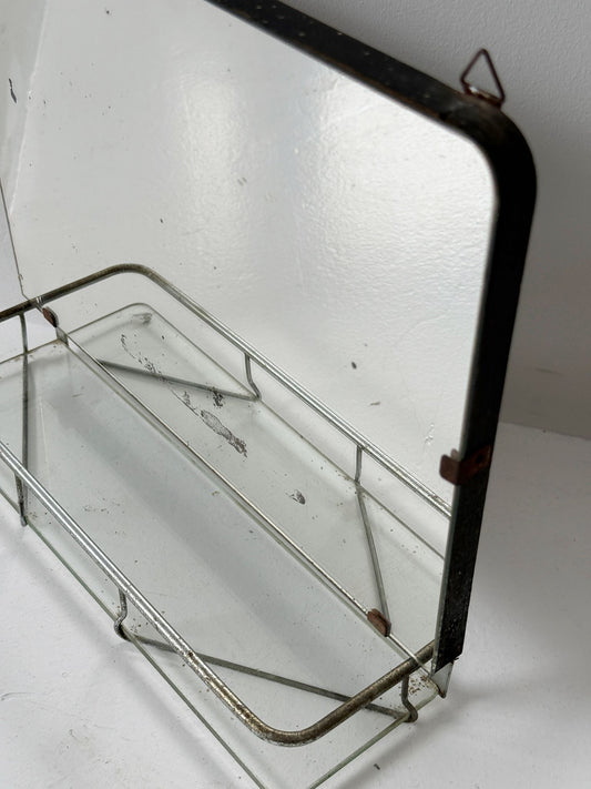 Small wall mirror with glass shelf
