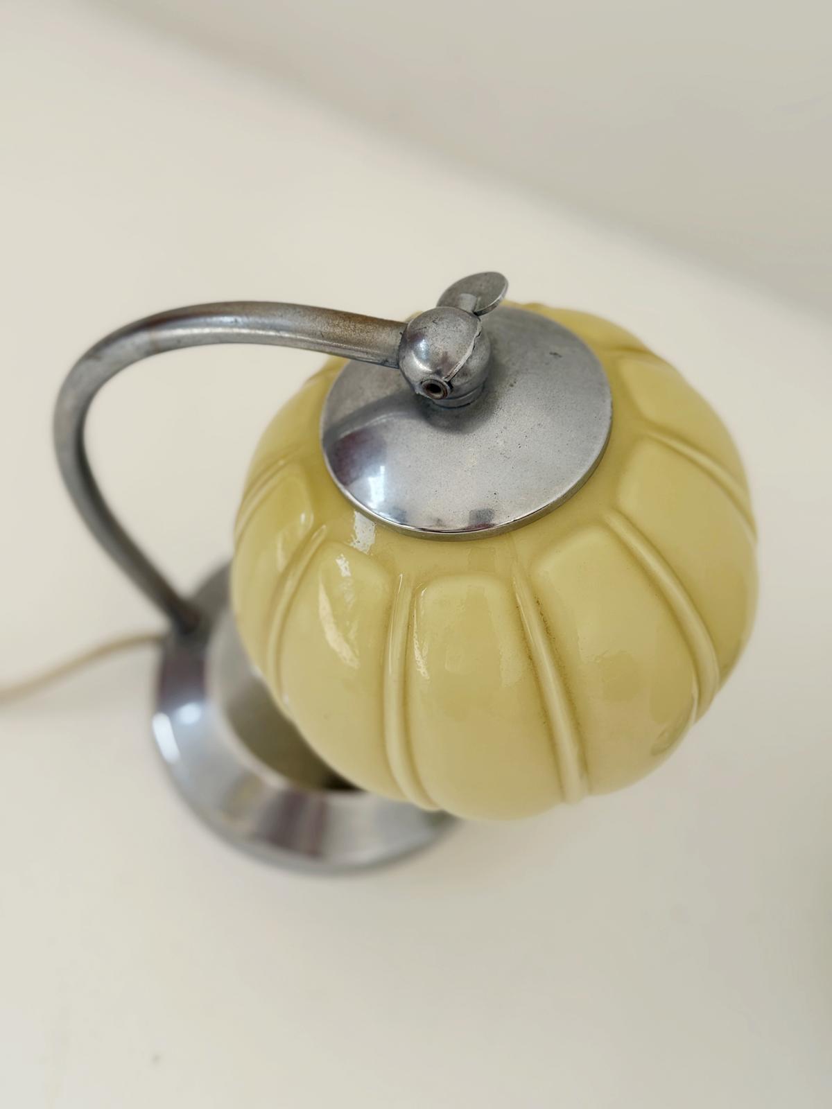 Pair of Space Age lampshades in chromed metal and yellow glass, 1960s