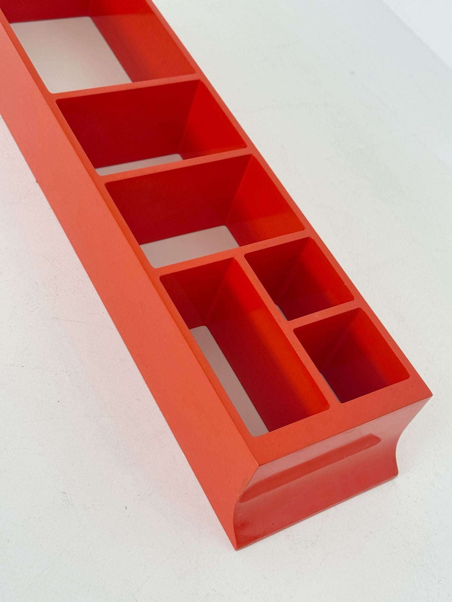 Modular shelf in orange lacquered wood – 1970s