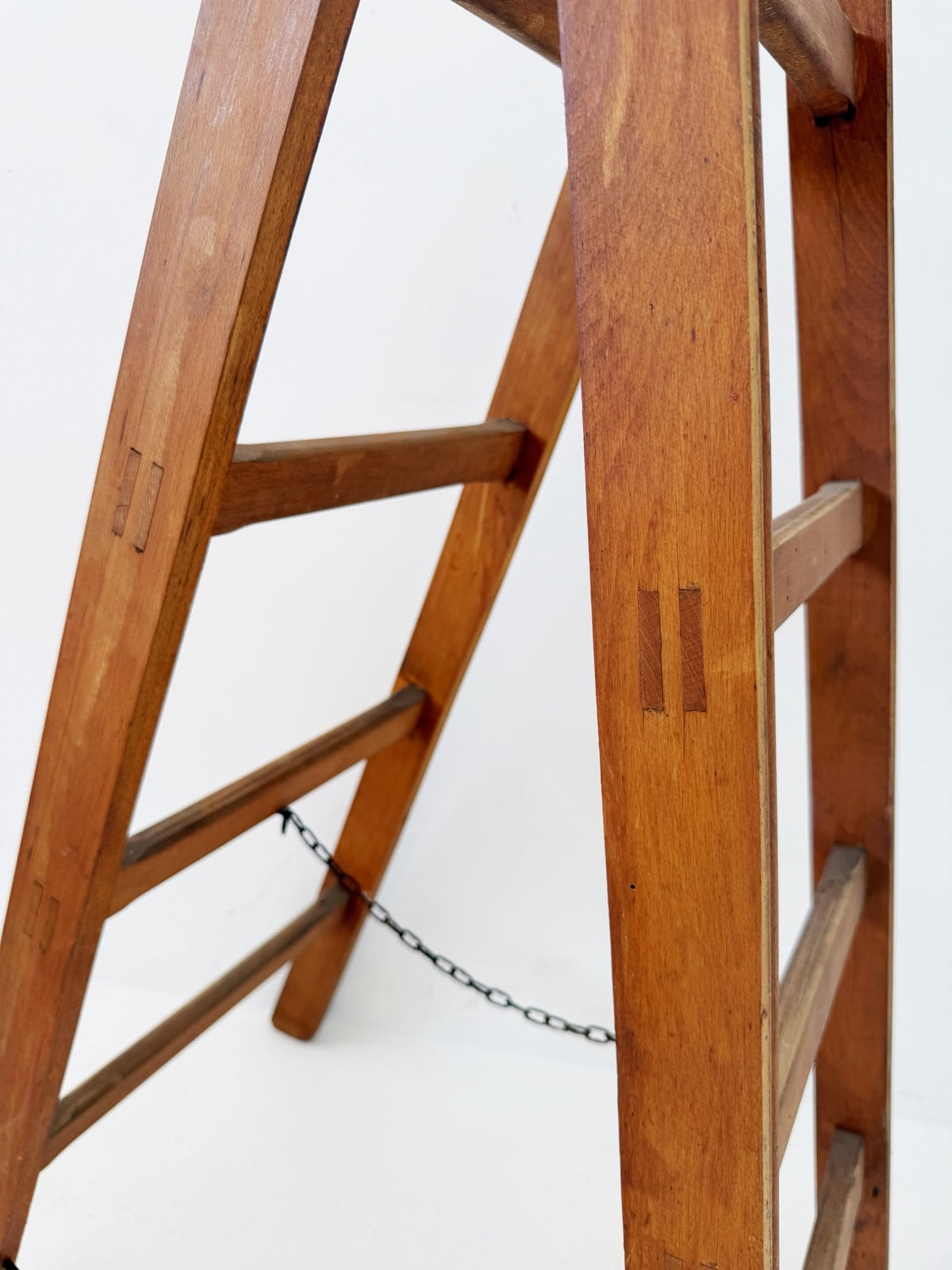 Wooden A-frame ladder with iron hardware, mid-20th century