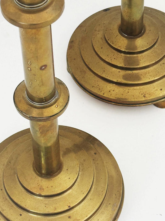Pair of brass candelabra, circa 1950s – architectural stepped line