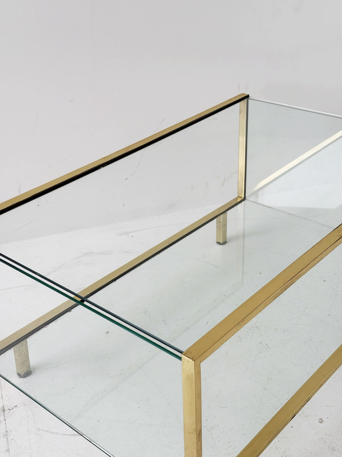 Gold-tone metal and glass coffee table, 1970s.