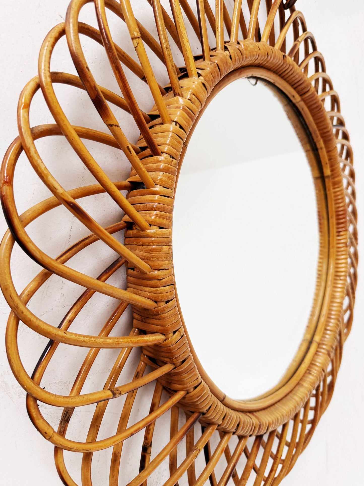 Oval rattan mirror – attributed to Bonacina (attr.)