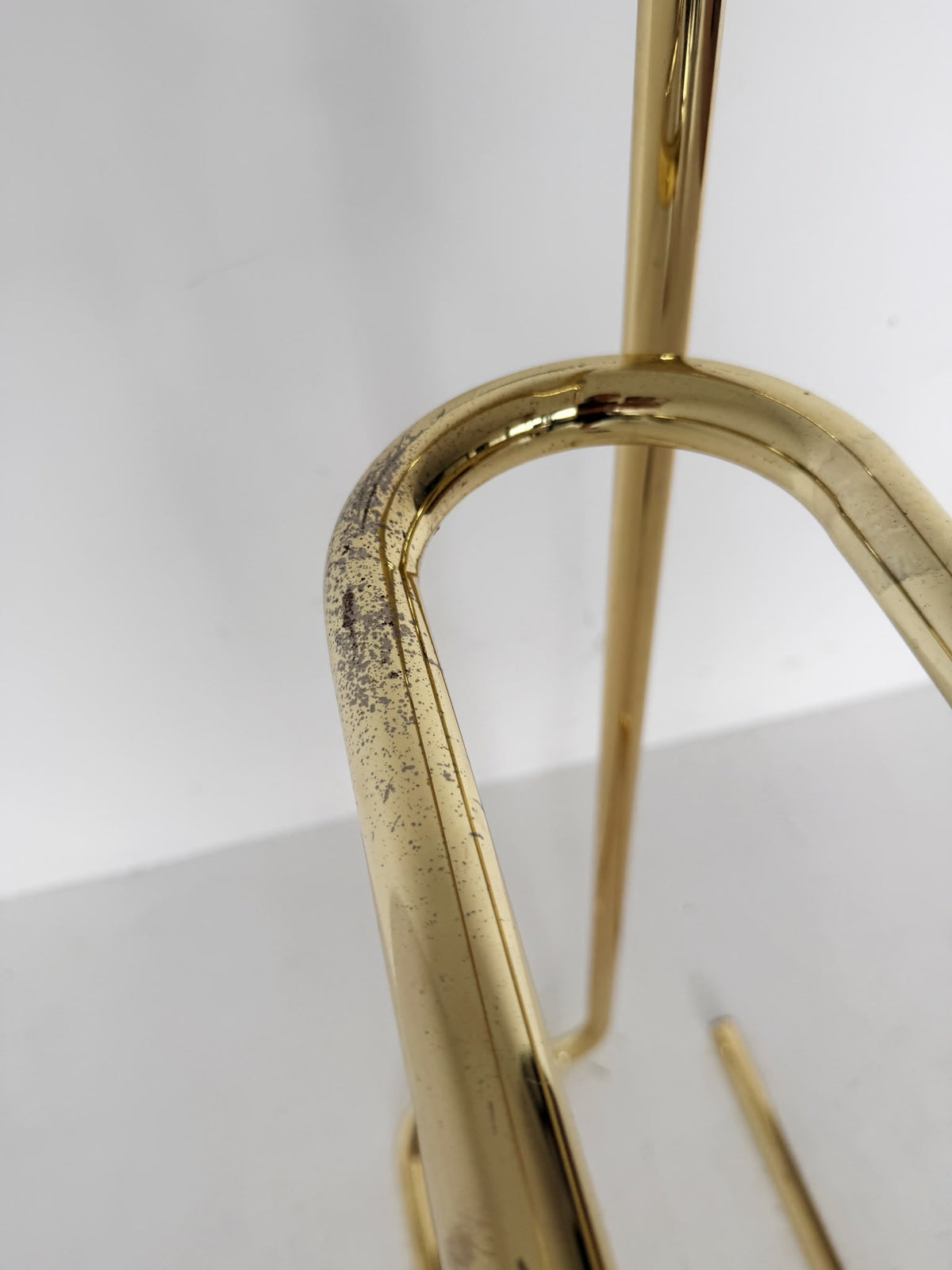 Gold-tone metal valet stand, 1960