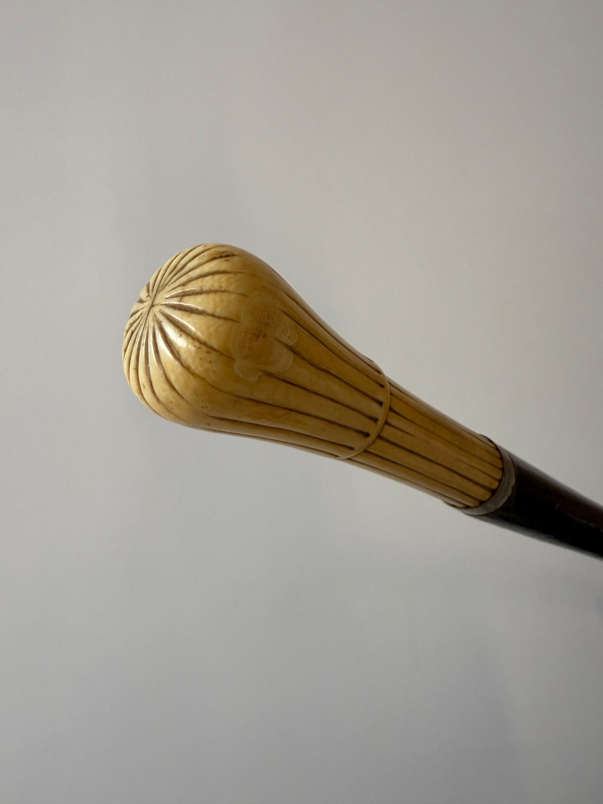 Walking stick with engraved bone handle, early 1900s