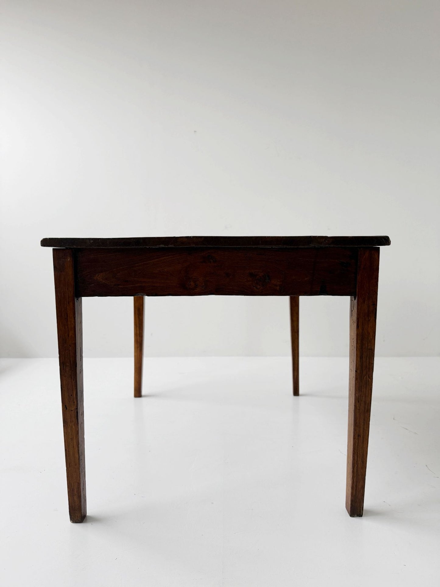 Directoire walnut table with central drawer, Italy, late 18th century