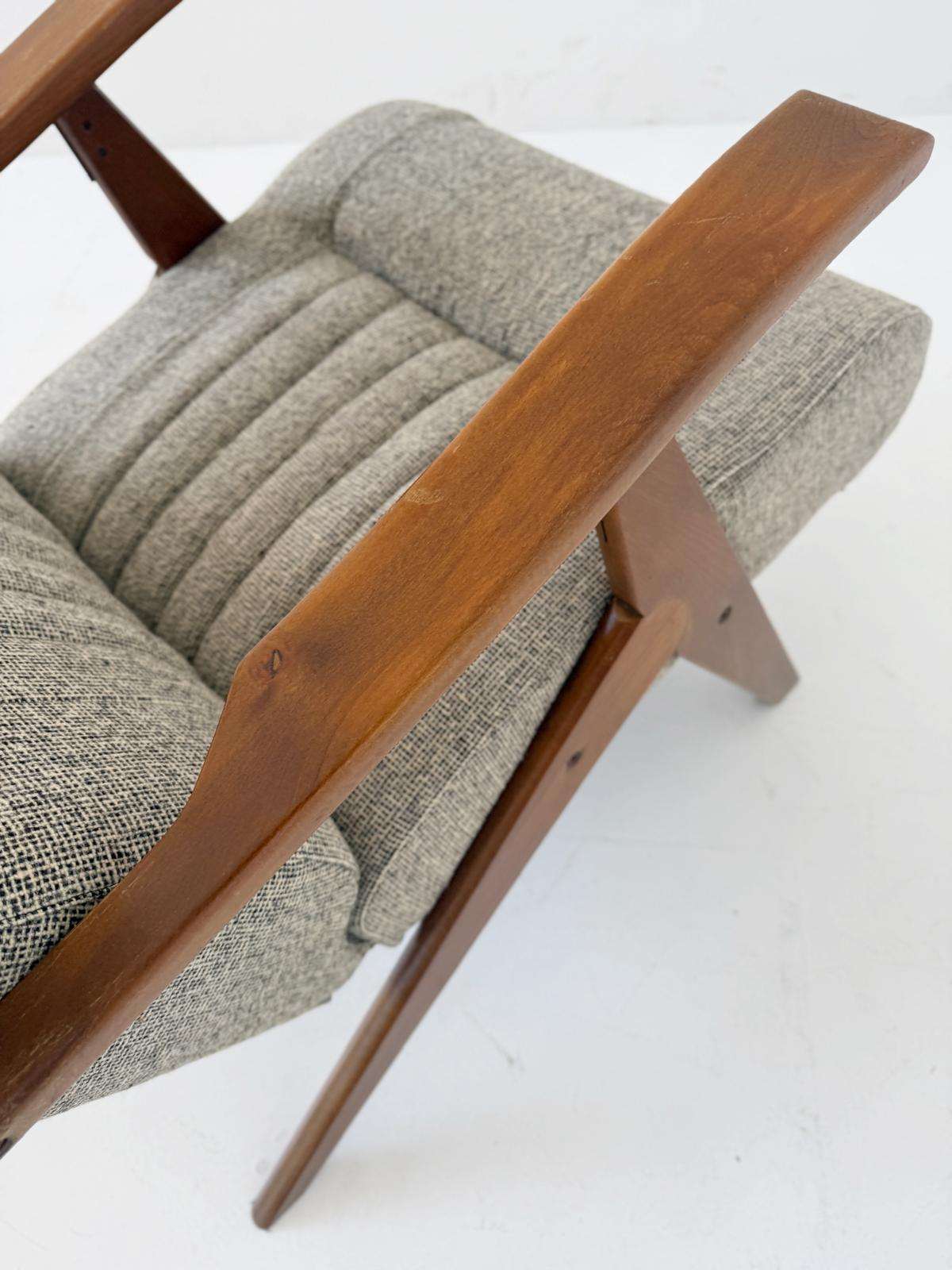 Reclining armchair in wood and fabric – 1960s