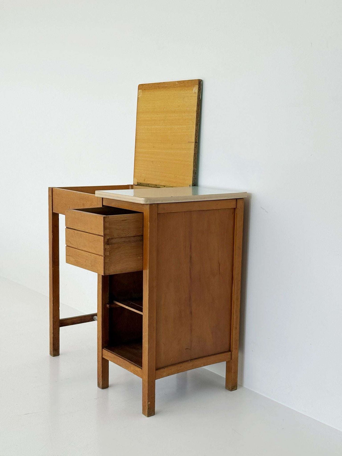 Compact writing desk with fold-out top, 1950s