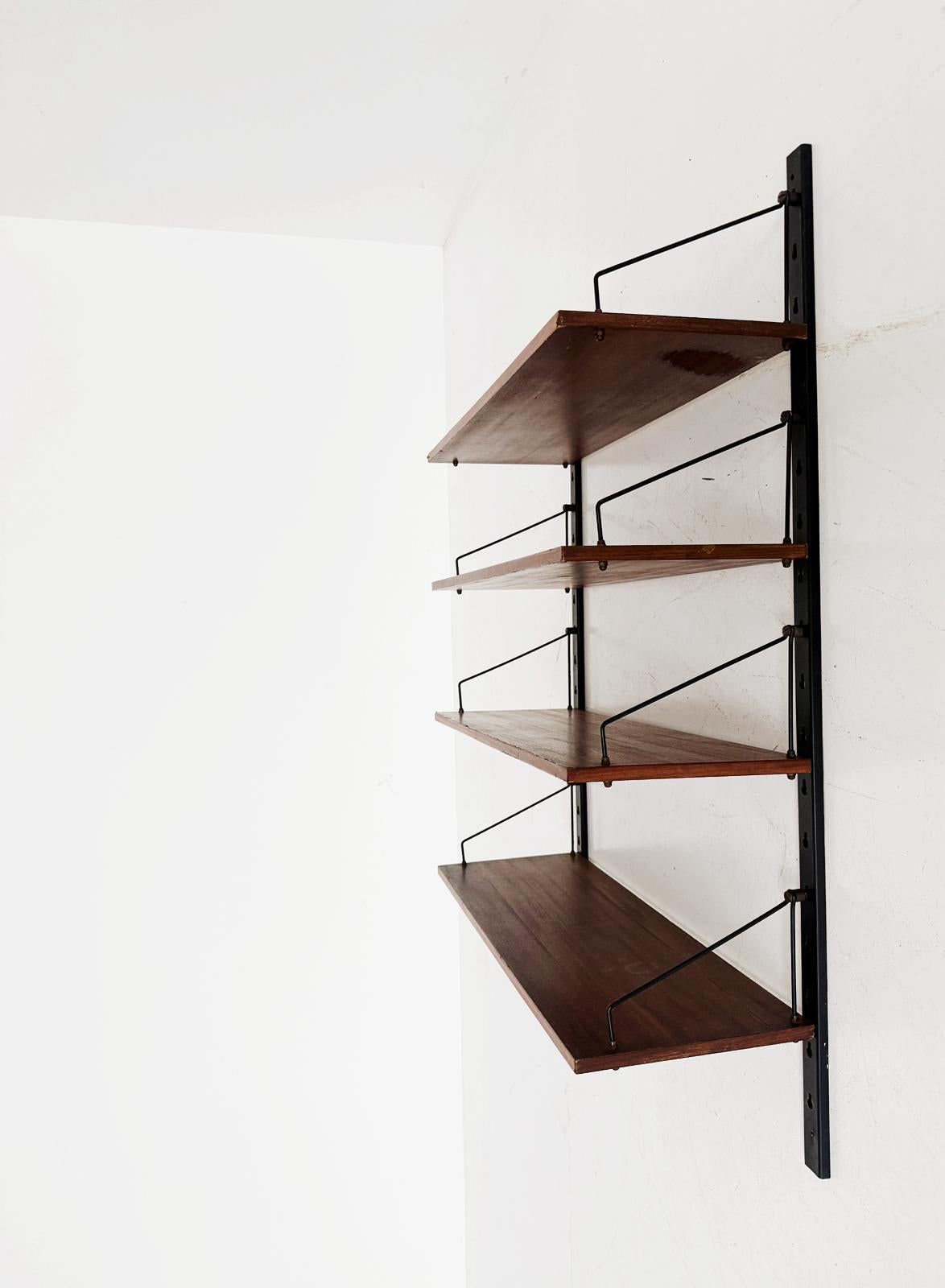 Mid-century-style modular wall-mounted bookcase/shelf, likely dating to the 1950s or 1960s.