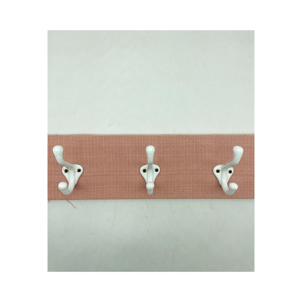 Pink and white clothes hanger