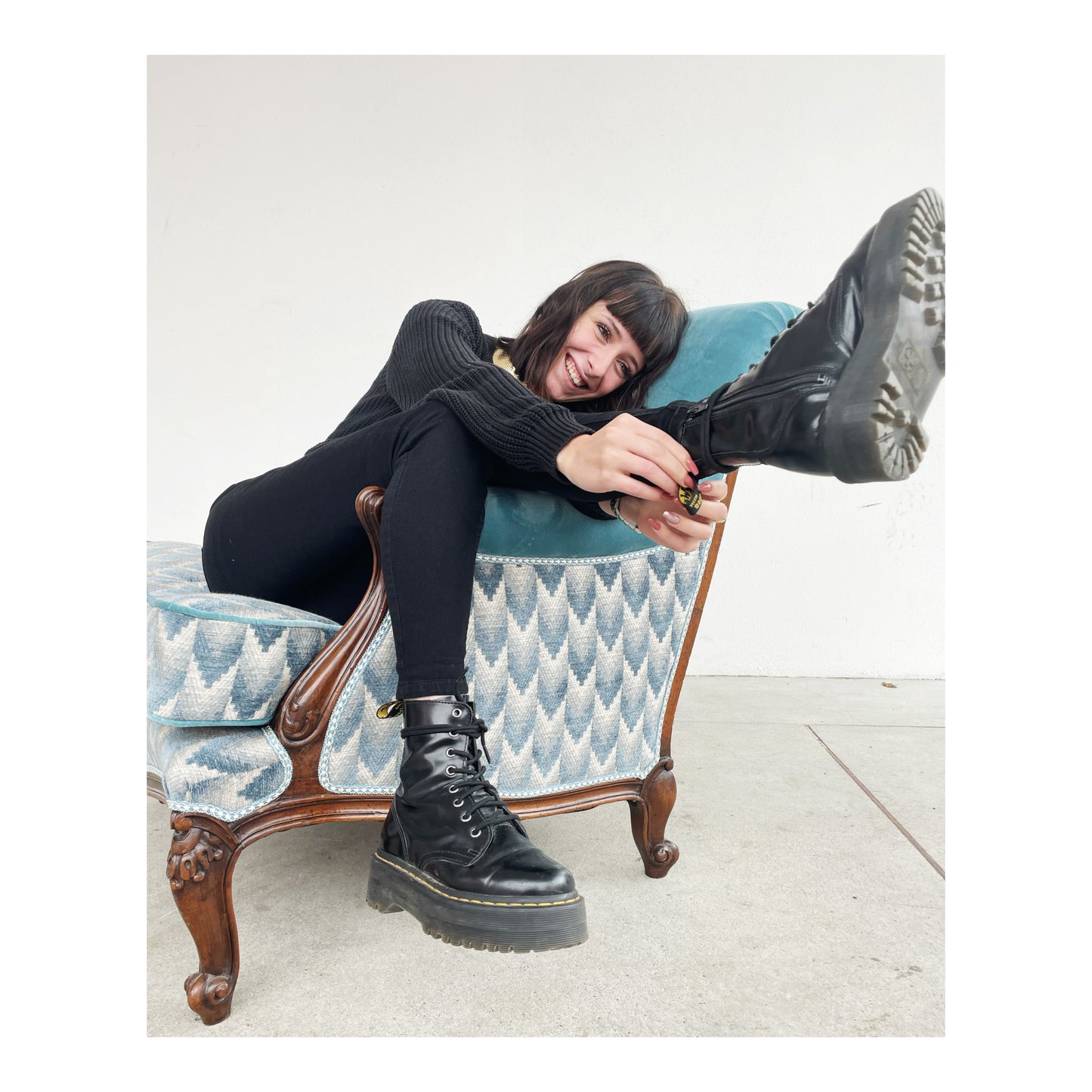 Light blue and wood armchair