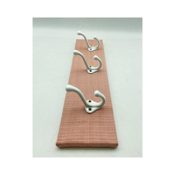 Pink and white clothes hanger