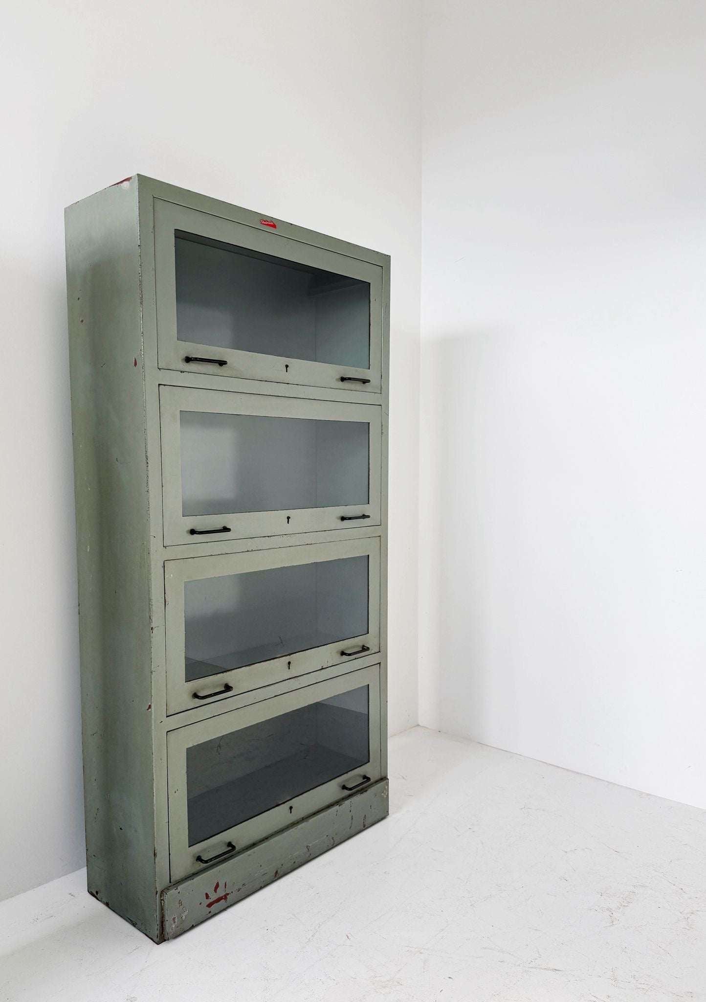 Industrial glass-fronted metal cabinet, 4 tilting doors – 1940s/1950s