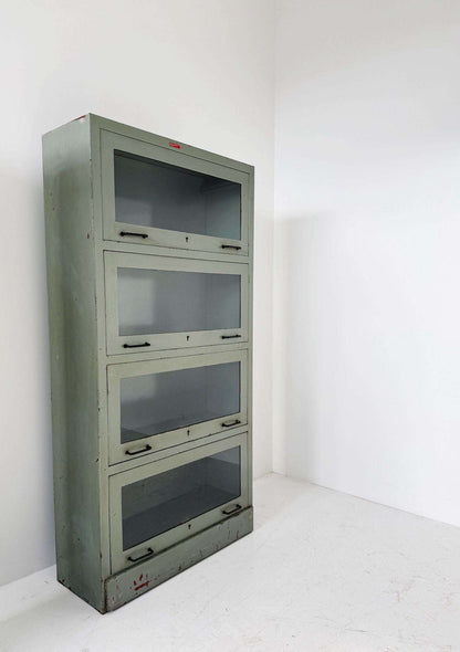 Industrial glass-fronted metal cabinet, 4 tilting doors – 1940s/1950s