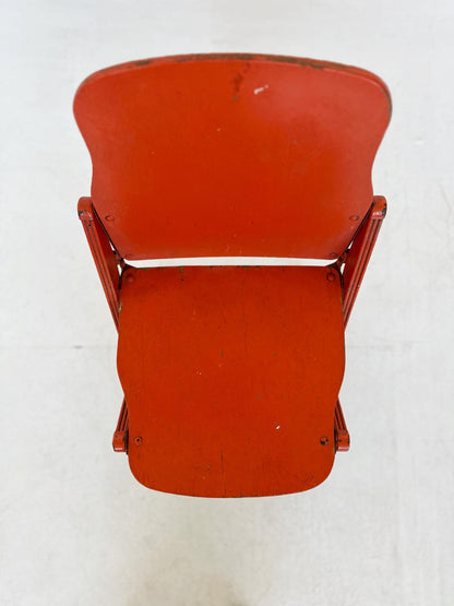 Folding orange chair