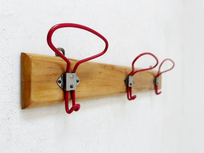 Clothes hanger with three hanges