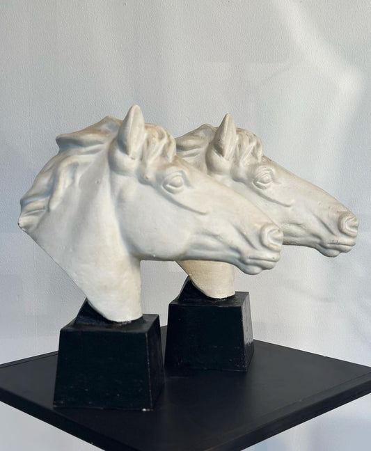 Pair of cast iron horse heads