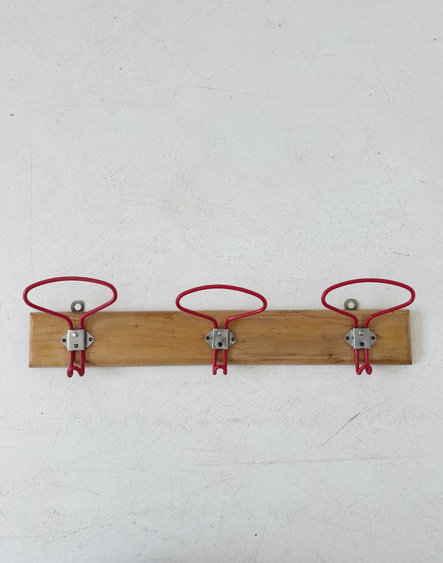 Clothes hanger with three hanges