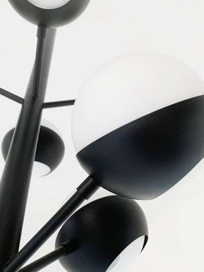 Black chandelier with glass spheres