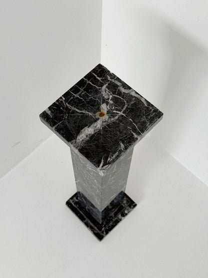 Black veined marble backsplash