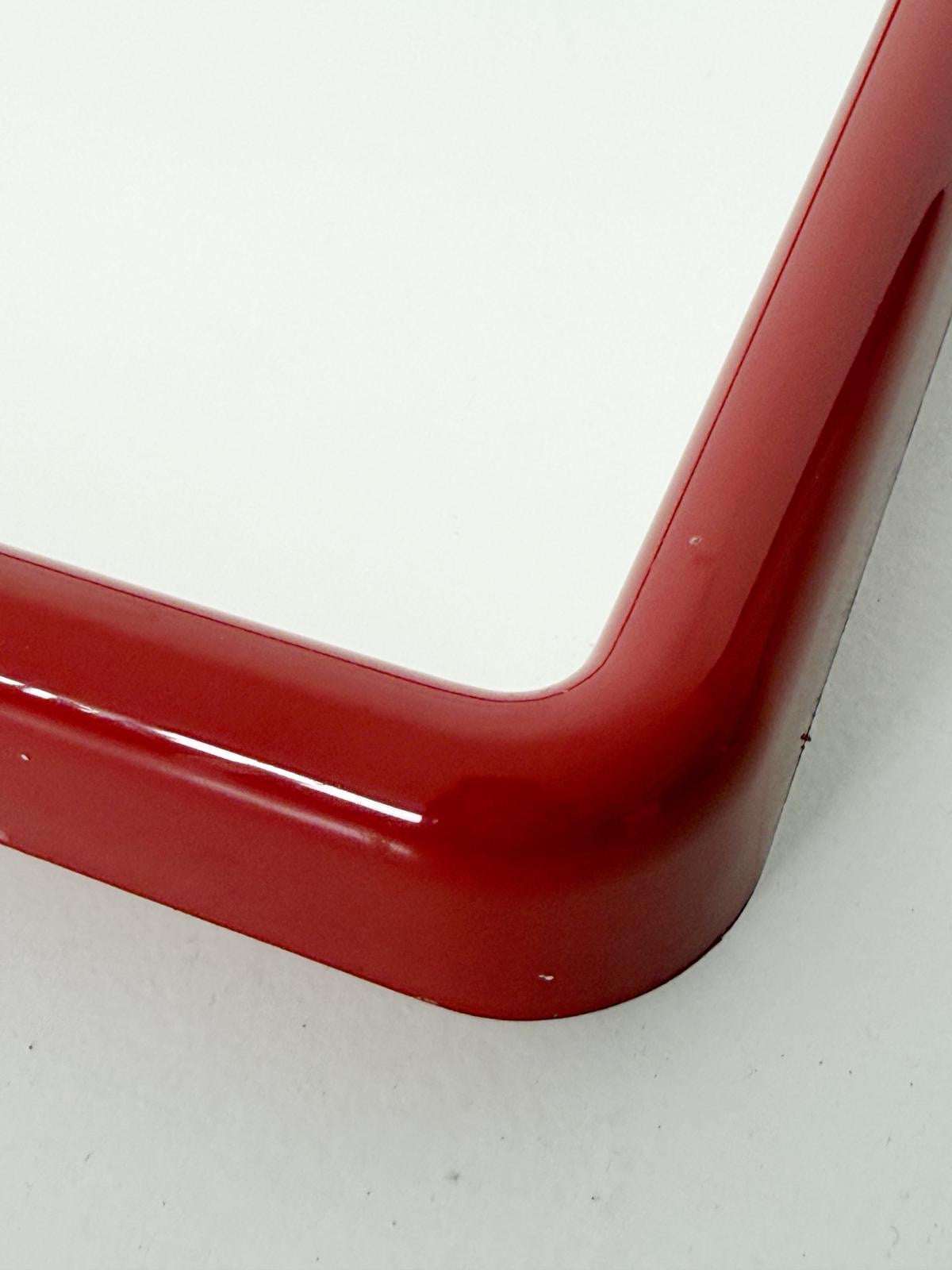 A pop-style wall mirror produced in the 1970s,