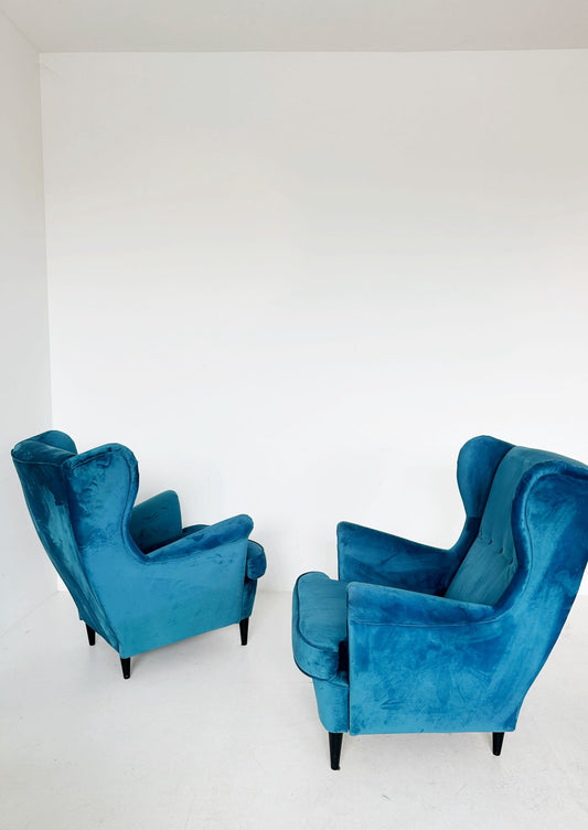 Pair of teal velvet armchairs