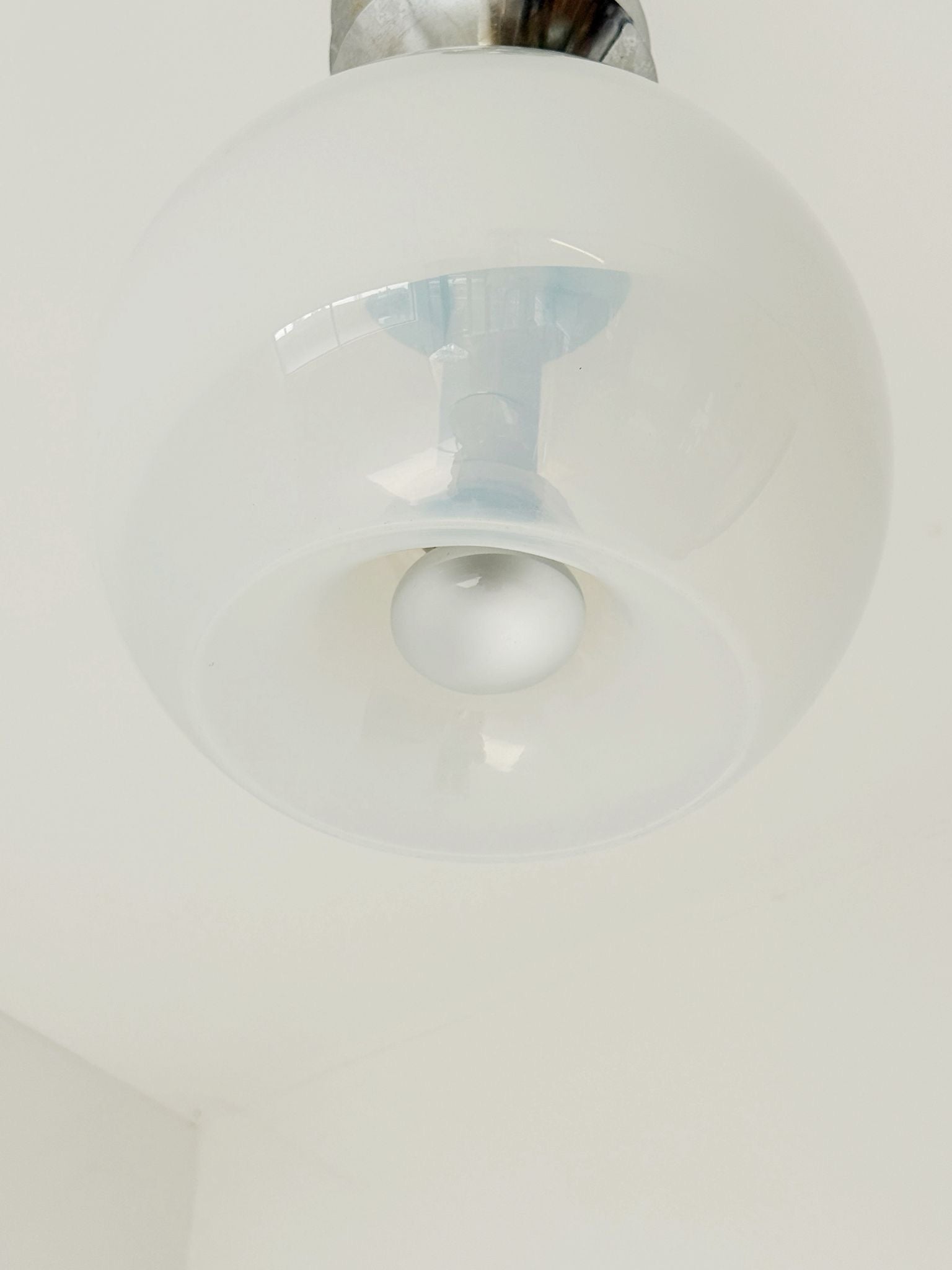 Pendant lamp with overlapping metal elements and an opaline globe – Italy, 1970s