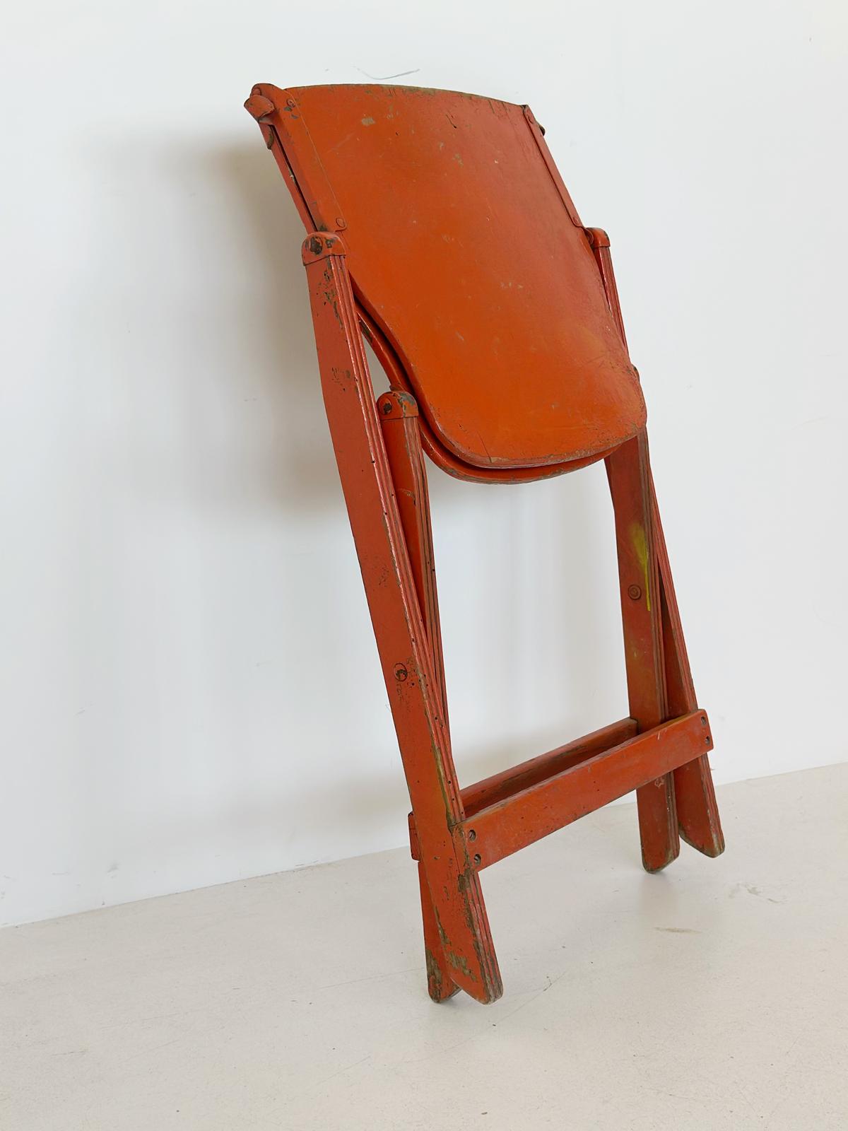Folding orange chair