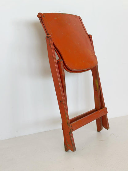 Folding orange chair
