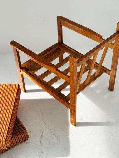 Solid wood armchair with striped upholstery