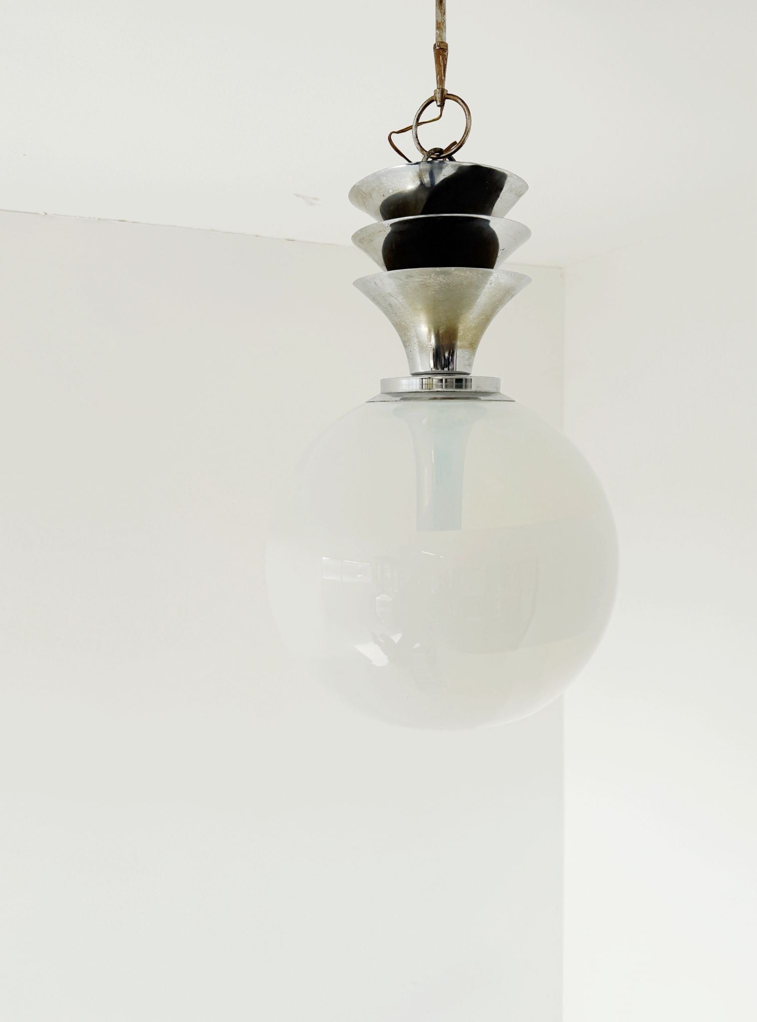 Pendant lamp with overlapping metal elements and an opaline globe – Italy, 1970s