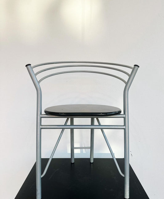 Four metal chairs