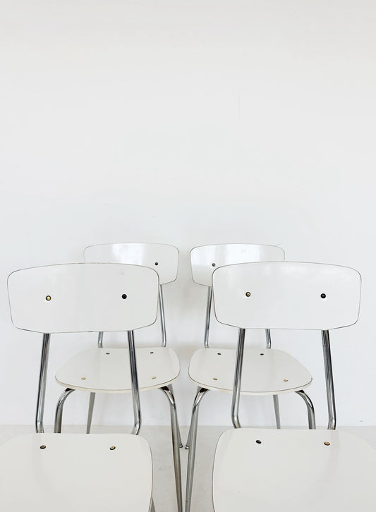 Four formica chairs