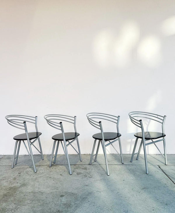 Four metal chairs