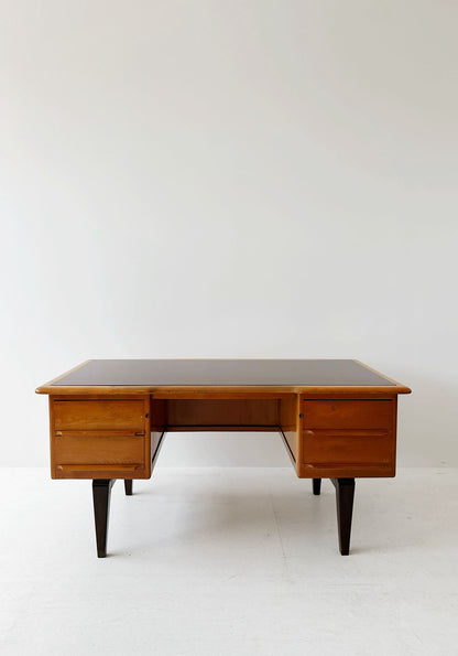 Desk with brown glass top