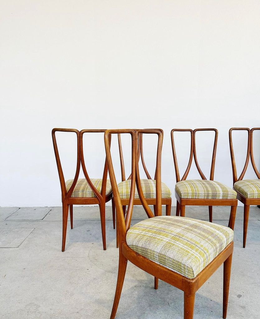 Five chairs in wood and fabric