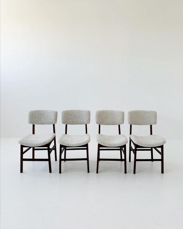 Four bouclè chairs